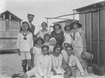 Scheda Gruppo di amici di Bronzetti in spiaggia a Mondello Valdesi